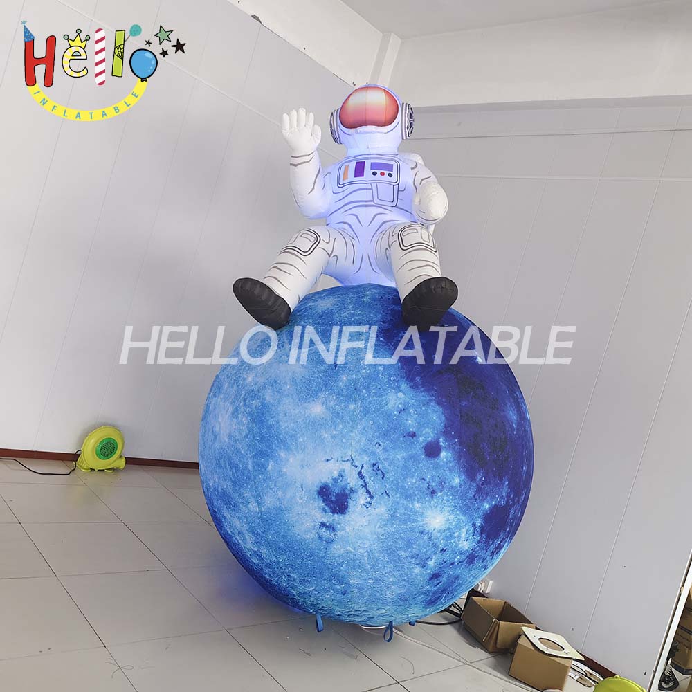 Customized Cartoon Astronaut Inflatable Design Advertising Inflatables Featuring an Astronaut Sitting on a Planet