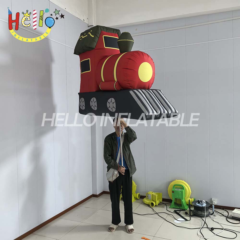 The Factory Produces High-quality Inflatable Hand-held Christmas Cartoon Trains for Parade Activities