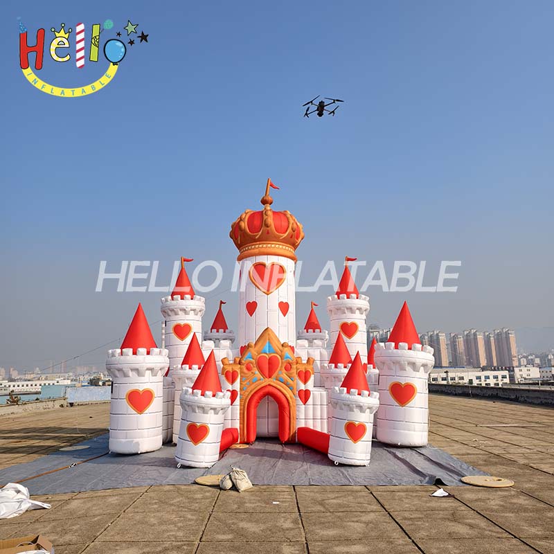 Giant commercial outdoor red heart-shaped inflatable princess castle with continuous power supply by blower
