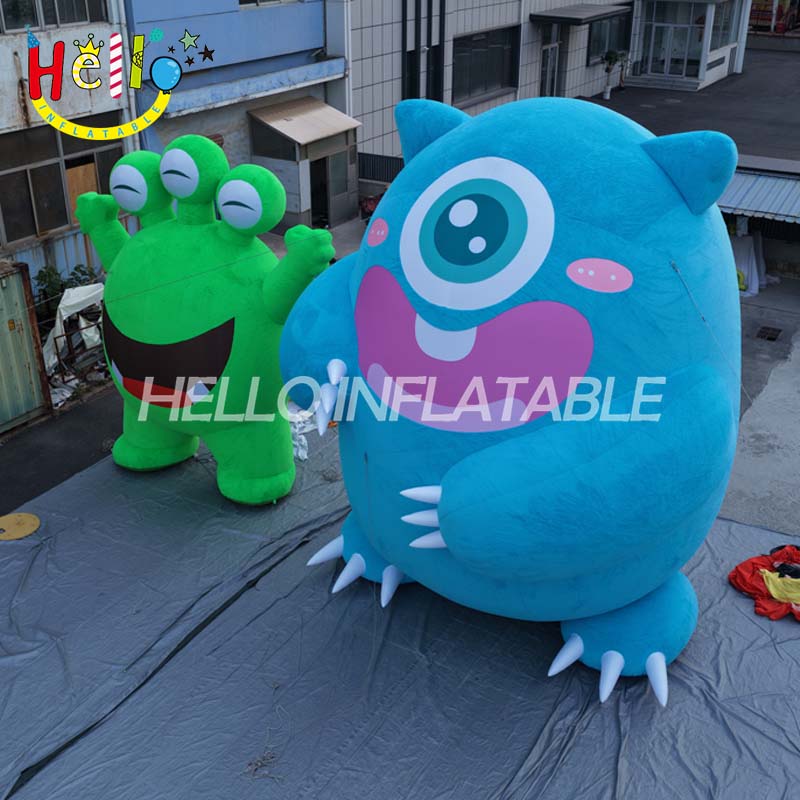 Giant LED Inflatable Monster Mascot Set, Custom Large Green Three-Eyed and Blue One-Eyed Cartoon Creatures for Event Decoration and Advertising