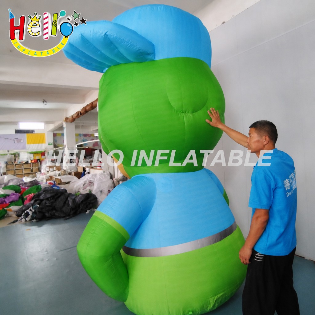 Giant Cute Green Dinosaur Mascot Inflatable with Baseball Cap Smiley Face for Outdoor Environmental Campaign Decoration
