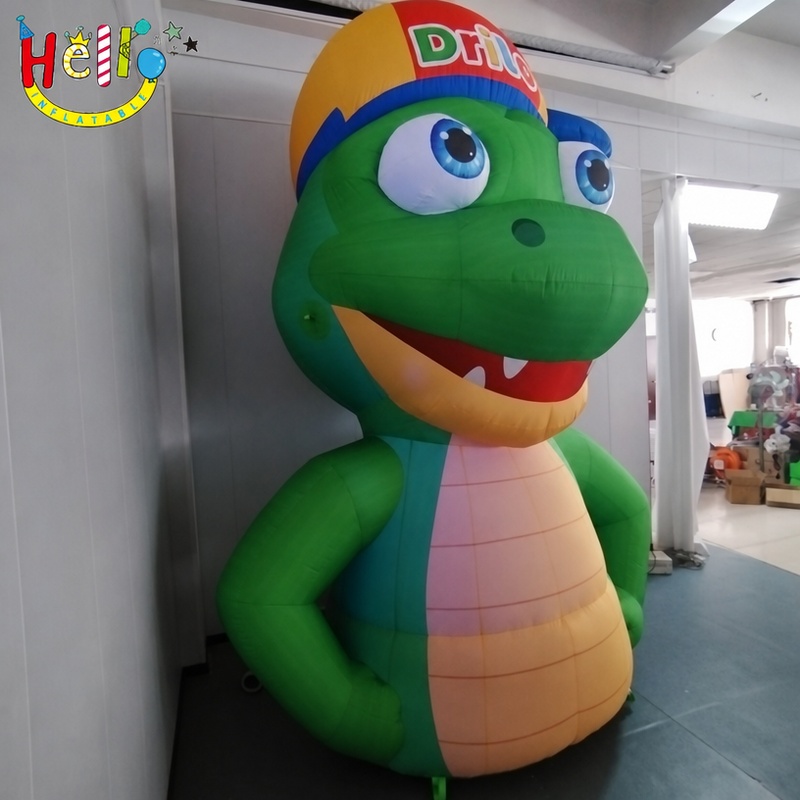Giant Cute Green Dinosaur Mascot Inflatable with Multi Color Cap for Outdoor Environmental Campaign Decoration