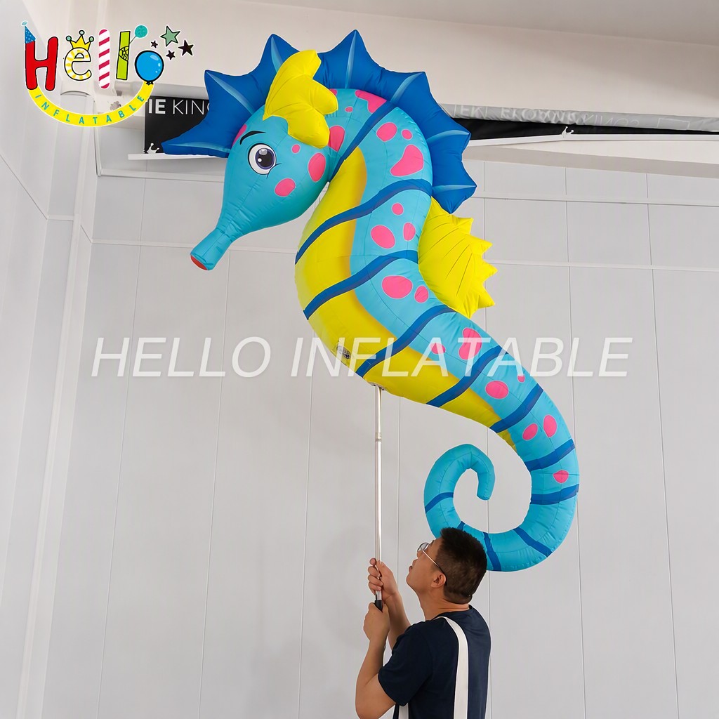 Giant Cartoon Blue Yellow Seahorse Inflatable with Red Snout Serrated Fin for Beach Party Ocean Theme Event Advertising Inflatables插图 Giant Cartoon Blue Yellow Seahorse Inflatable with Red Snout Serrated Fin for Beach Party Ocean Theme Event Advertising Inflatables