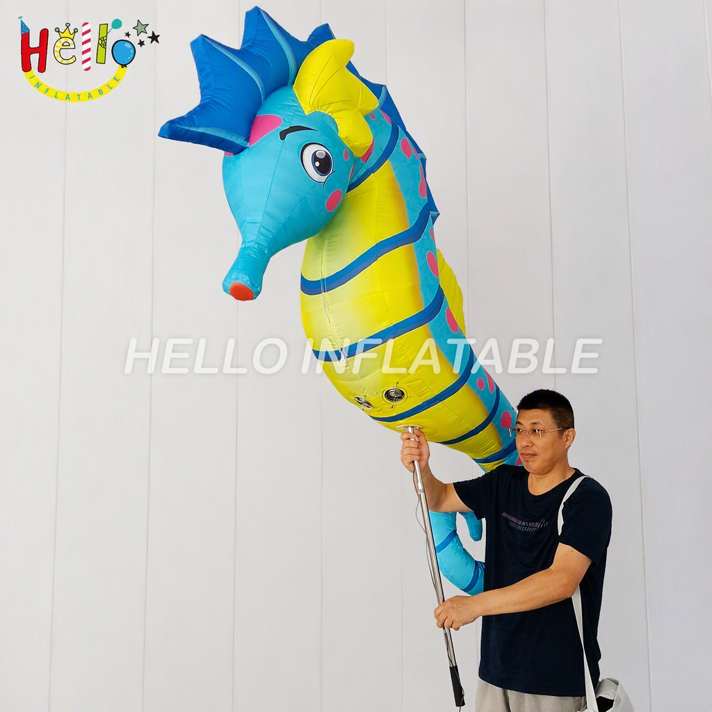 Giant Cartoon Blue Yellow Seahorse Inflatable with Red Snout Serrated Fin for Beach Party Ocean Theme Event Advertising Inflatables插图2 Giant Cartoon Blue Yellow Seahorse Inflatable with Red Snout Serrated Fin for Beach Party Ocean Theme Event Advertising Inflatables
